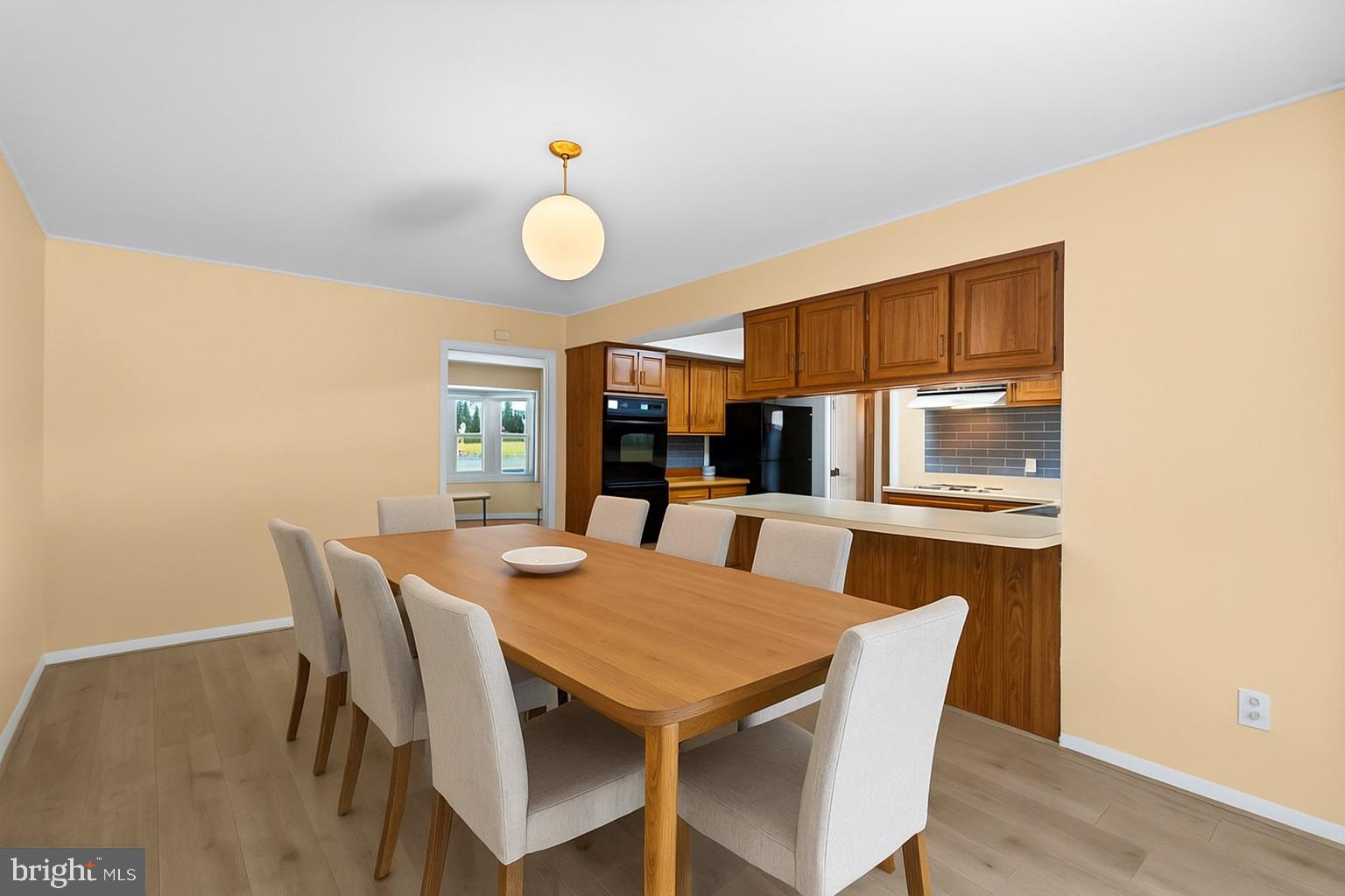 12306 Shadetree Lane Laurel, MD 20708 - Photo 16 of 55 virtually staged eat in kitchen