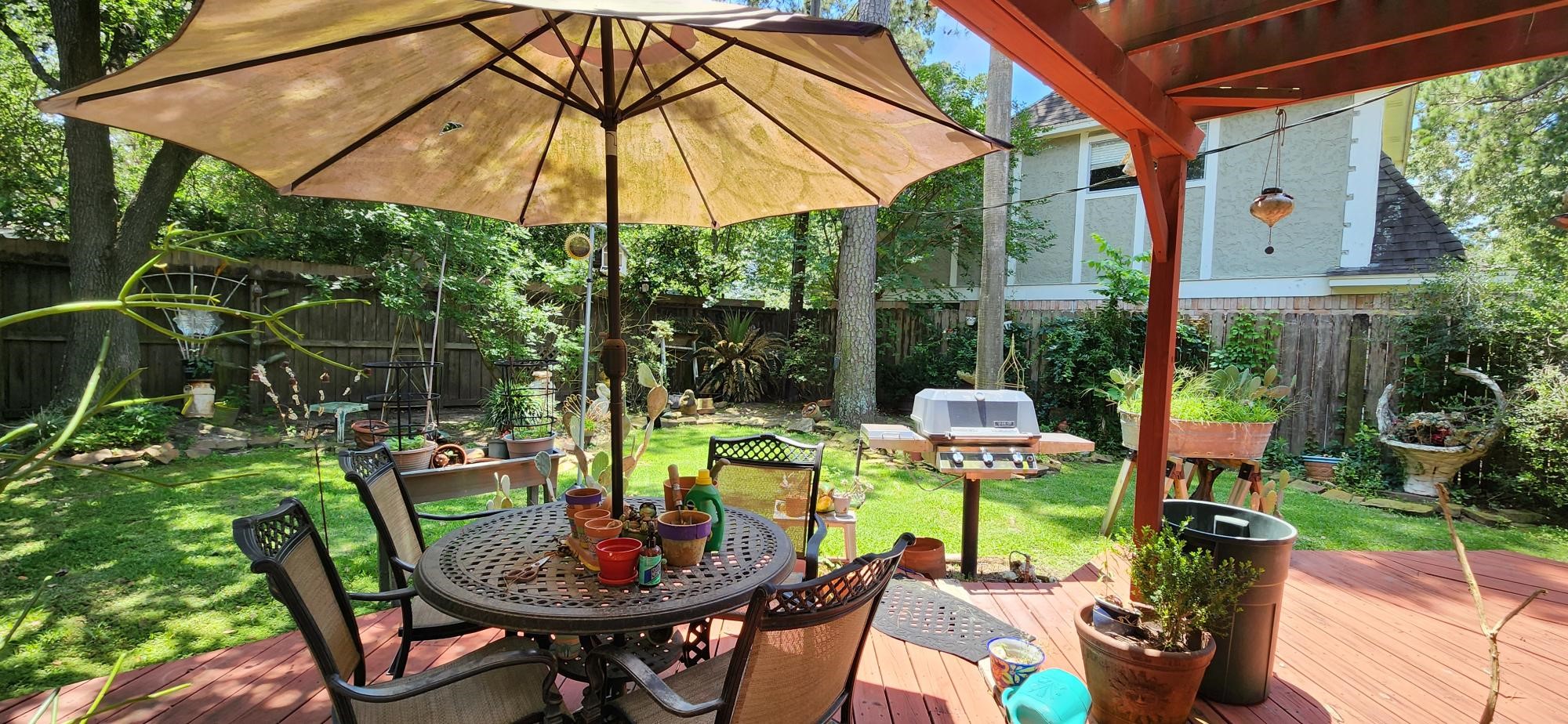 16155 Hexham Drive Spring, TX 77379 - Photo 44 of 47 a view of an outdoor sitting area with furniture and backyard