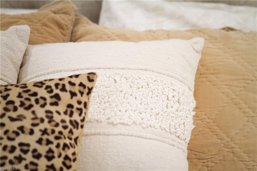 97 Georgetown Boulevard, Unit 97 Naples, FL 34112 - Photo 14 of 26 a bathroom with a bathtub and shower