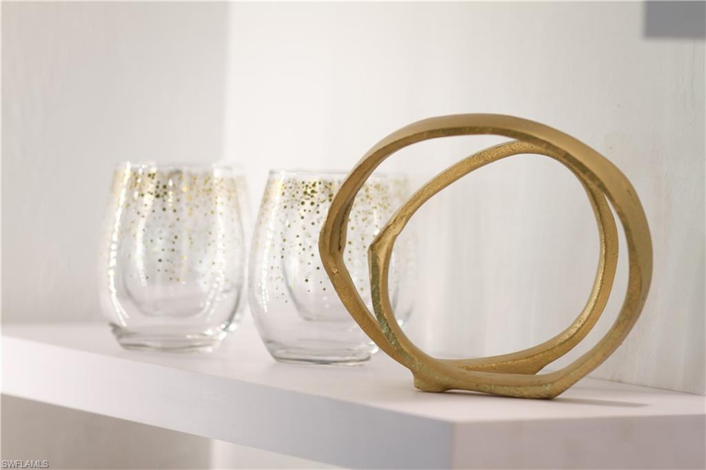 97 Georgetown Boulevard, Unit 97 Naples, FL 34112 - Photo 21 of 26 a view of a swimming pool with a potted plants