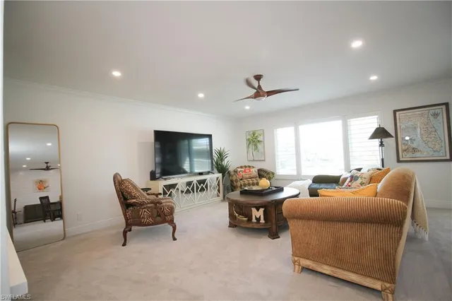 a kitchen with cabinets and wooden floor