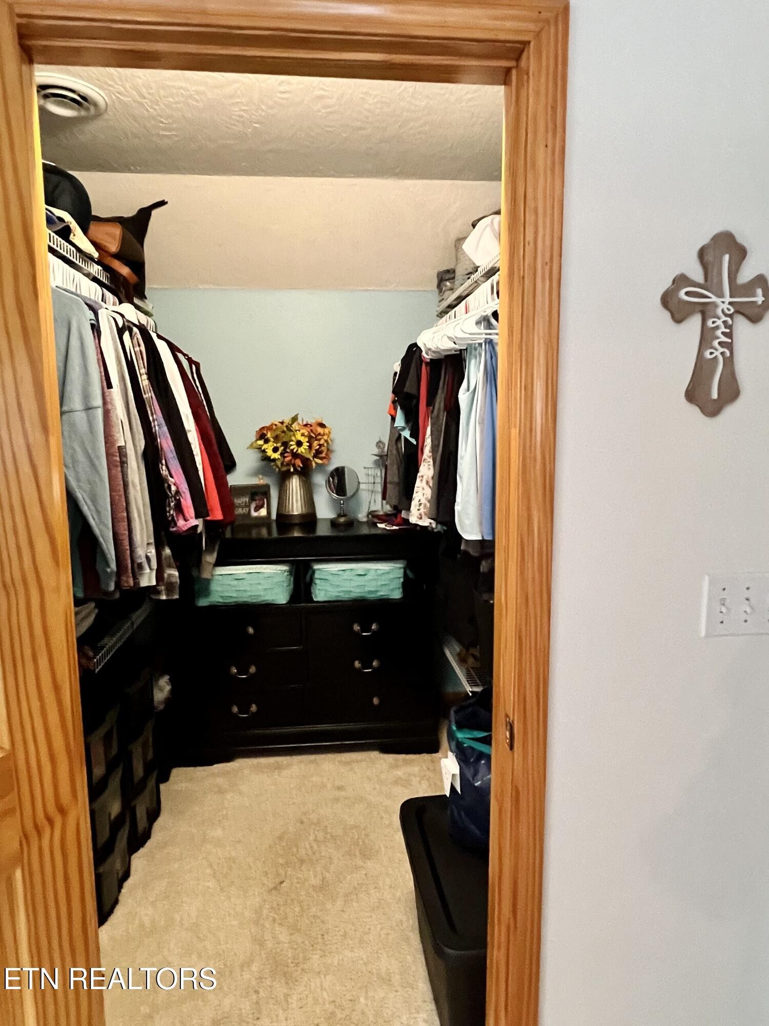 186 Perkins Trail Deer Lodge, TN 37726 - Photo 21 of 54 a view of walk in closet with clothes and shoes