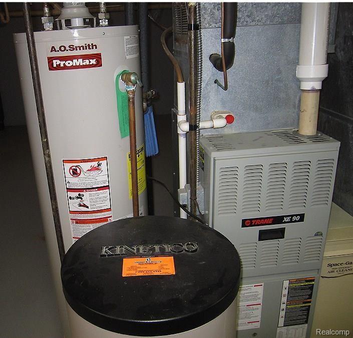 9296 Gale Road Goodrich, MI 48438 - Photo 16 of 31 Trane Furnace HW softner HW heater.jpg