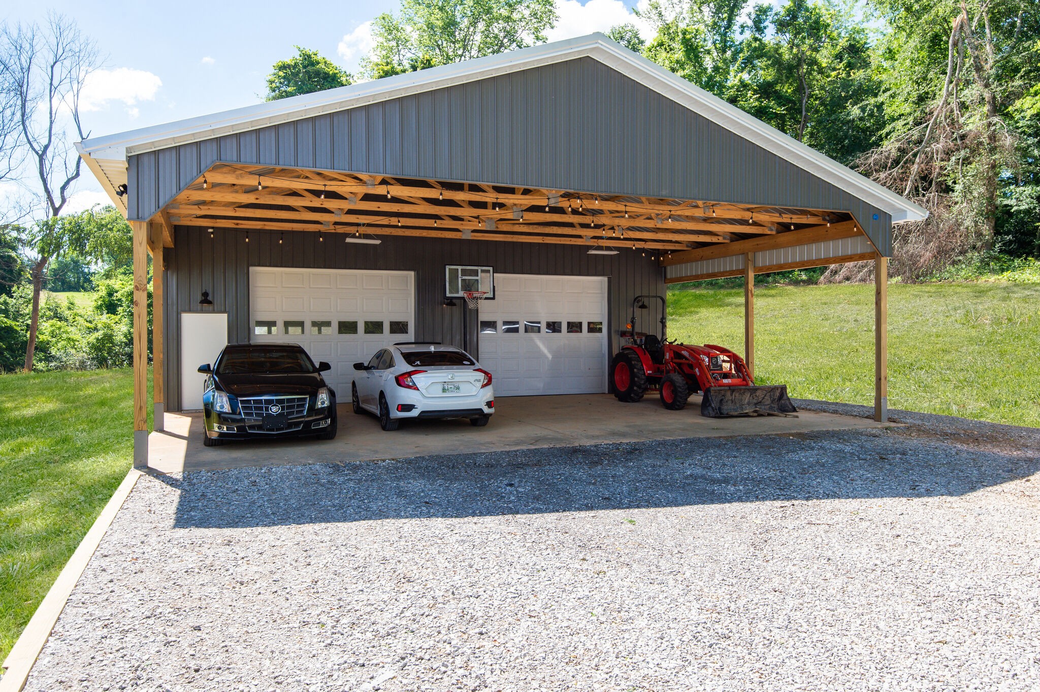 1495 Columbia Road Charlotte, TN 37036 - Photo 14 of 50 a car parked in front of house