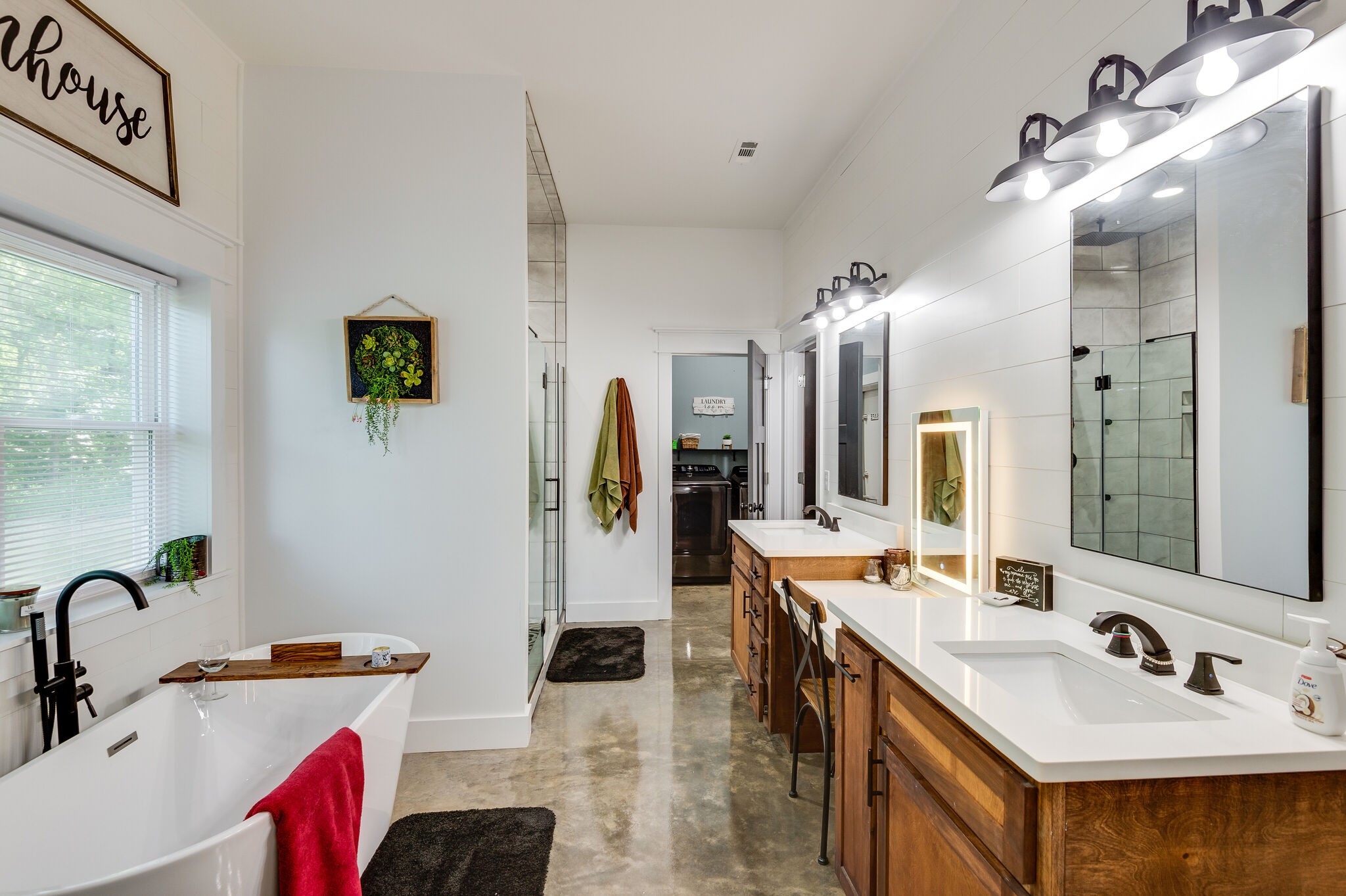 1495 Columbia Road Charlotte, TN 37036 - Photo 17 of 50 a bathroom with a sink double vanity and a mirror