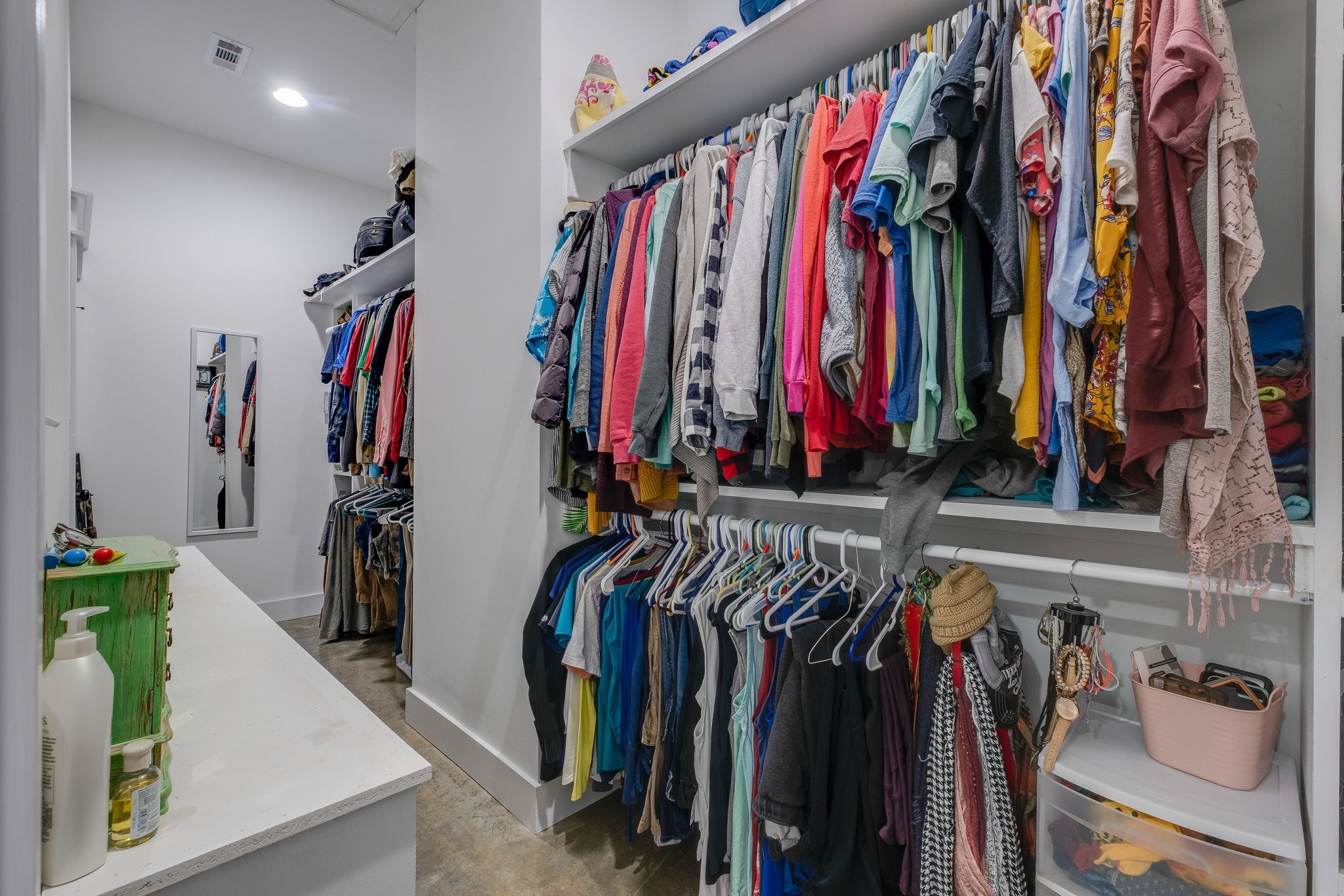 1495 Columbia Road Charlotte, TN 37036 - Photo 21 of 50 a view of walk in closet with clothes