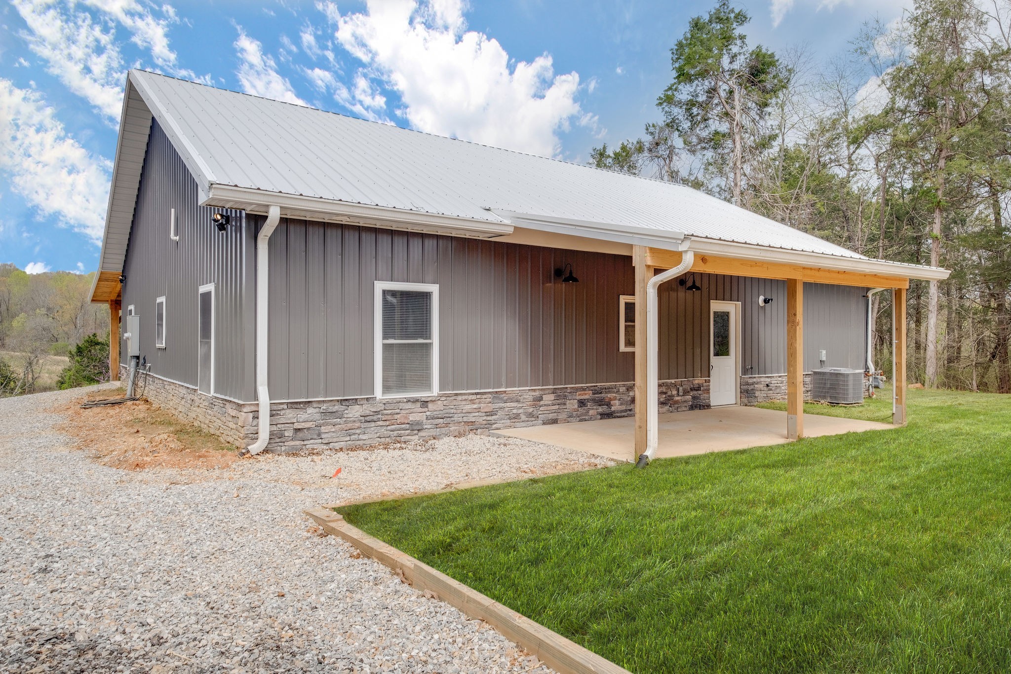 1495 Columbia Road Charlotte, TN 37036 - Photo 28 of 50 a view of a house with a yard and sitting area