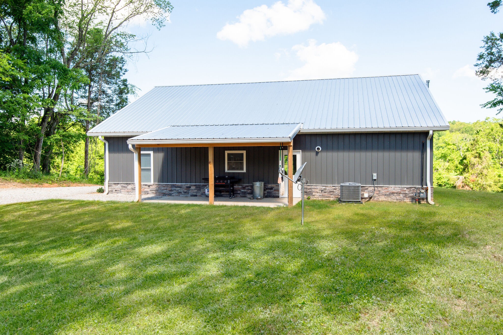 1495 Columbia Road Charlotte, TN 37036 - Photo 30 of 50 a front view of house with yard and green space