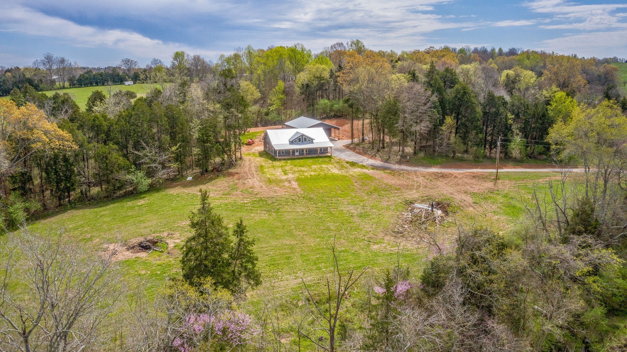 1495 Columbia Road Charlotte, TN 37036 - Photo 32 of 50 a view of a lake with a mountain
