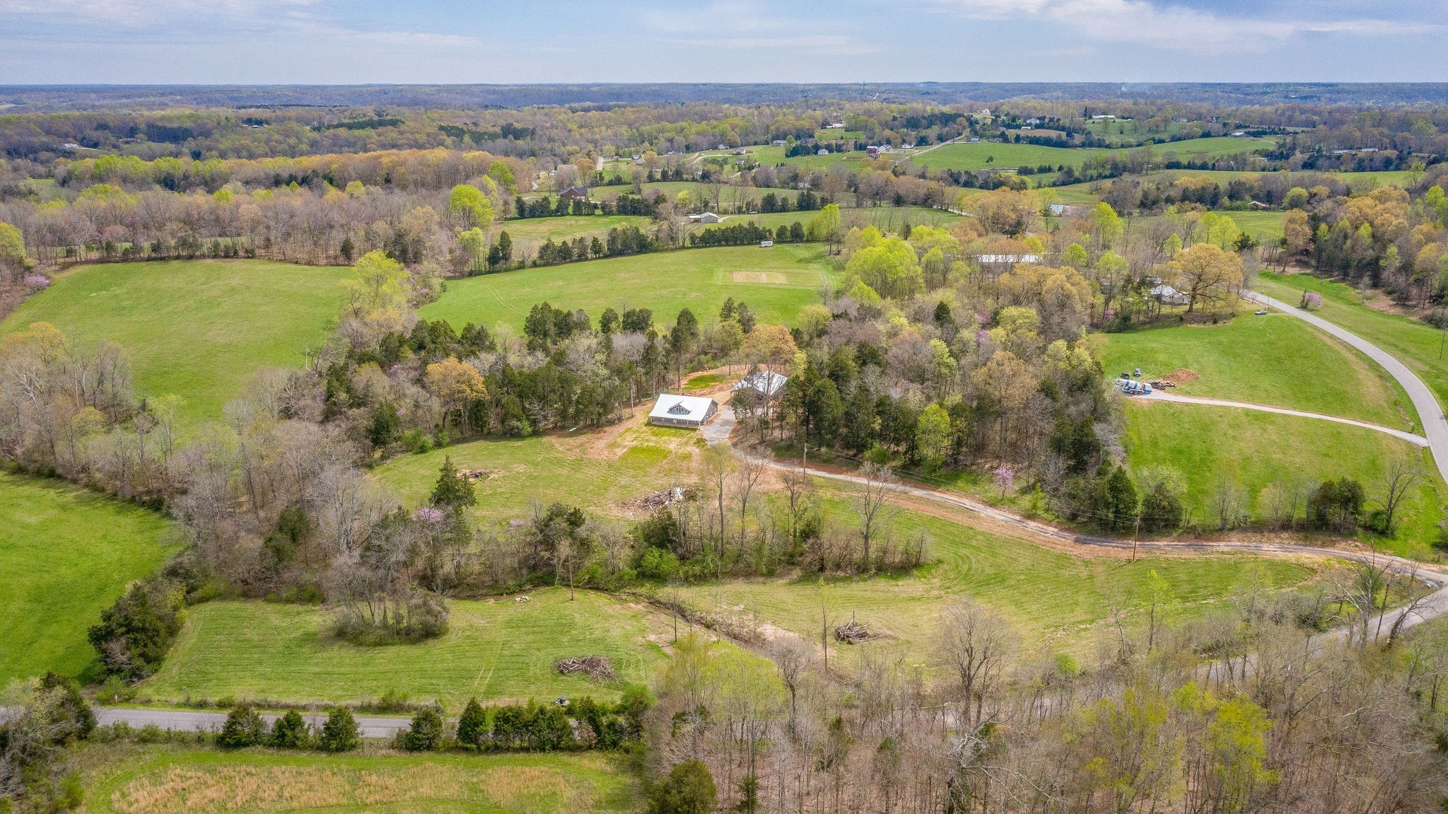 1495 Columbia Road Charlotte, TN 37036 - Photo 35 of 50 a view of a lake with a mountain in the back