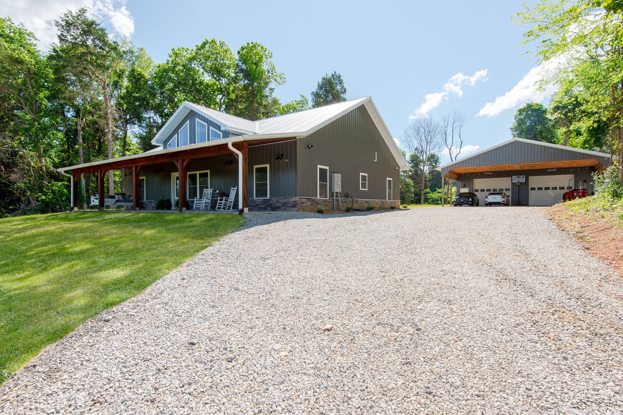 1495 Columbia Road Charlotte, TN 37036 - Photo 42 of 50 front view of a house with a yard