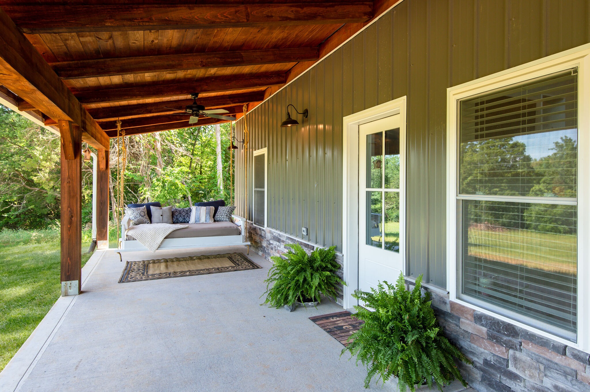 1495 Columbia Road Charlotte, TN 37036 - Photo 45 of 50 a porch with yard and outdoor seating