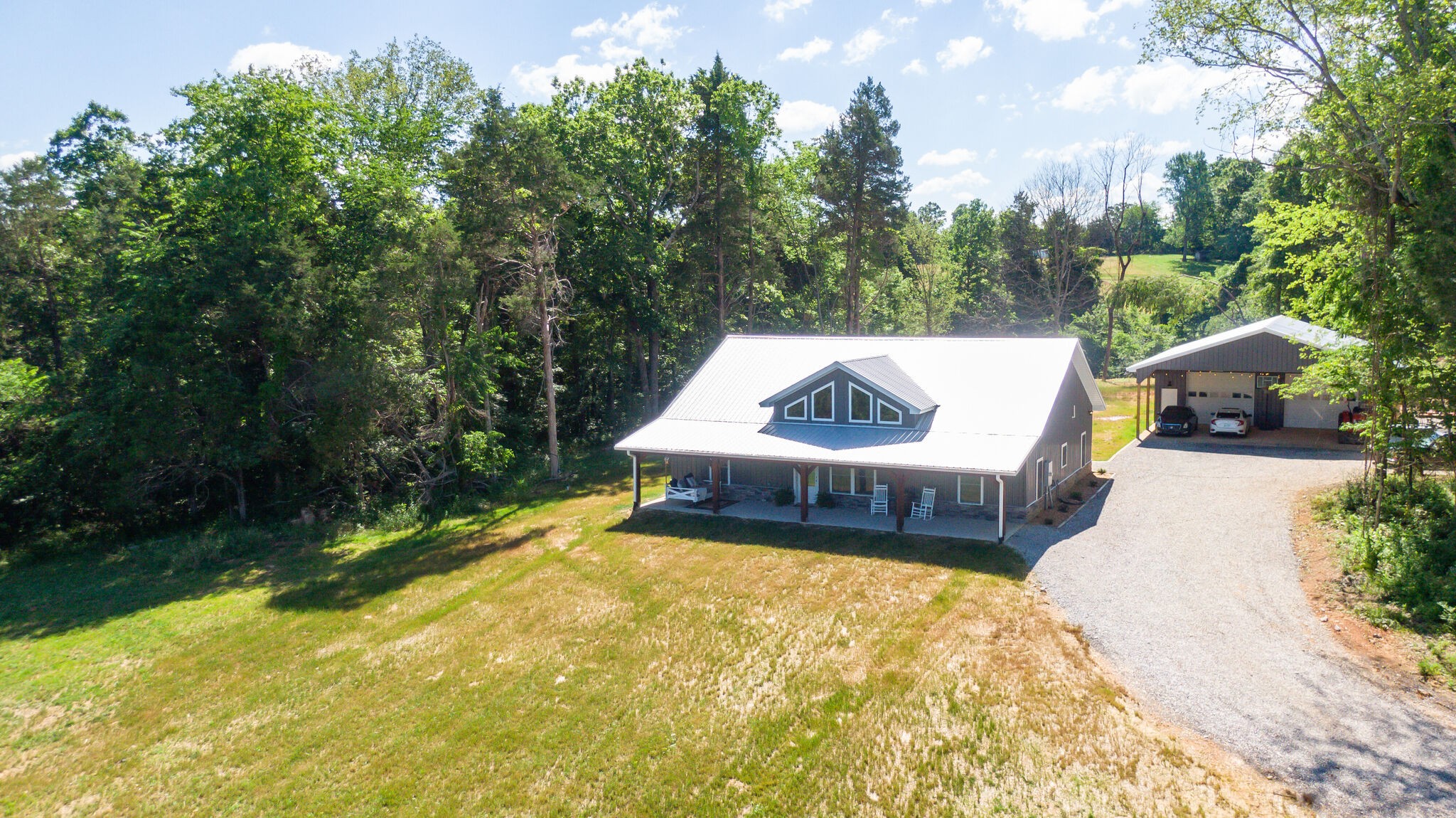 1495 Columbia Road Charlotte, TN 37036 - Photo 48 of 50 a view of a swimming pool with a patio