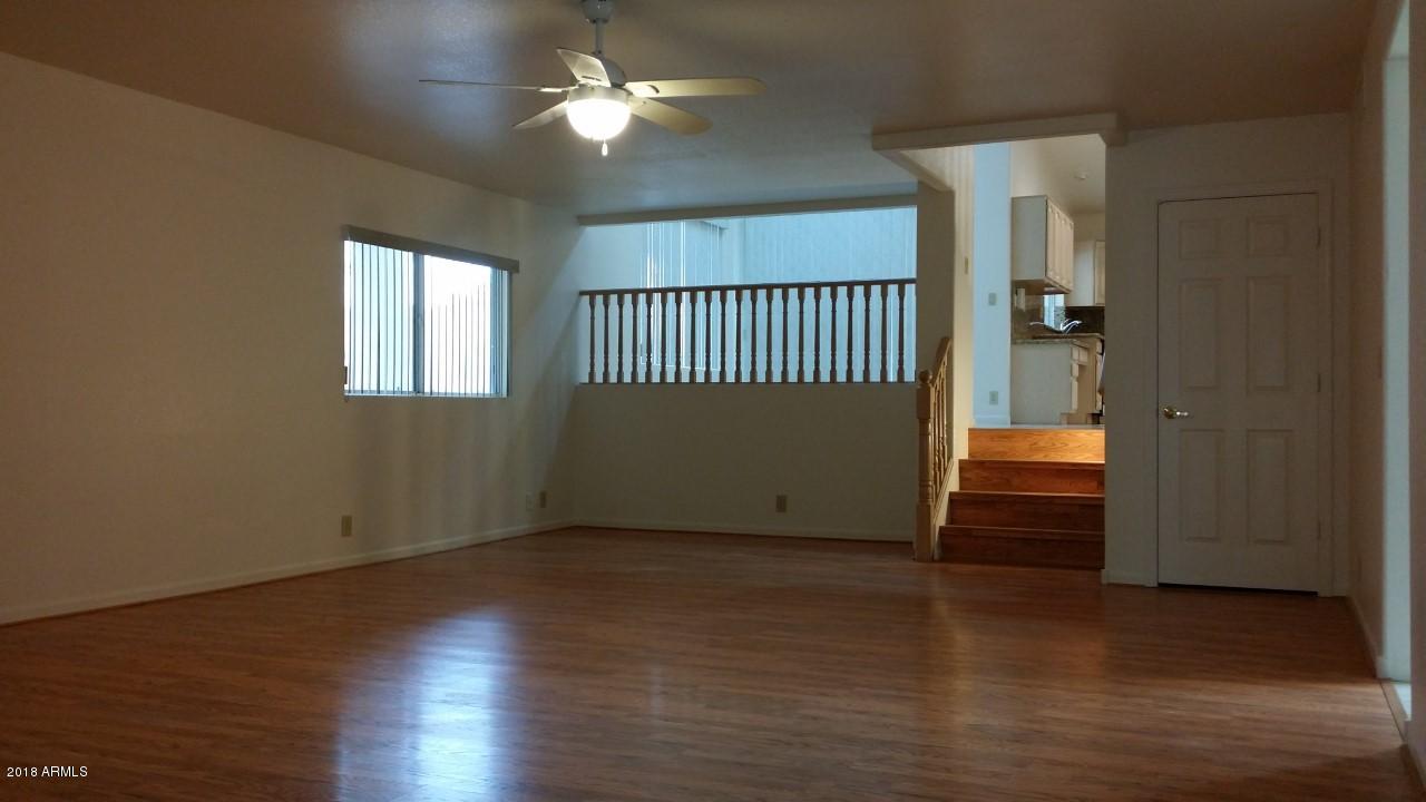 8754 West Wethersfield Road Peoria, AZ 85381 - Photo 9 of 32 Wethersfield Rd, Family Room 1