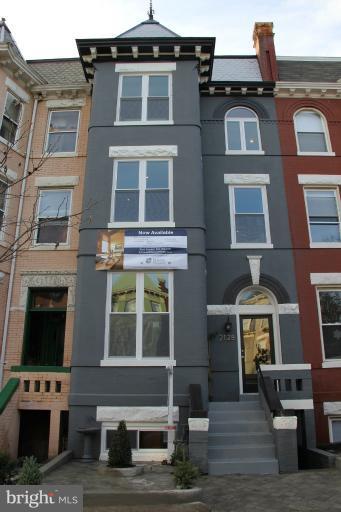 2128 1st Street Northwest, Unit 2 Washington, DC 20001 - Photo 1 of 28 a front view of residential houses