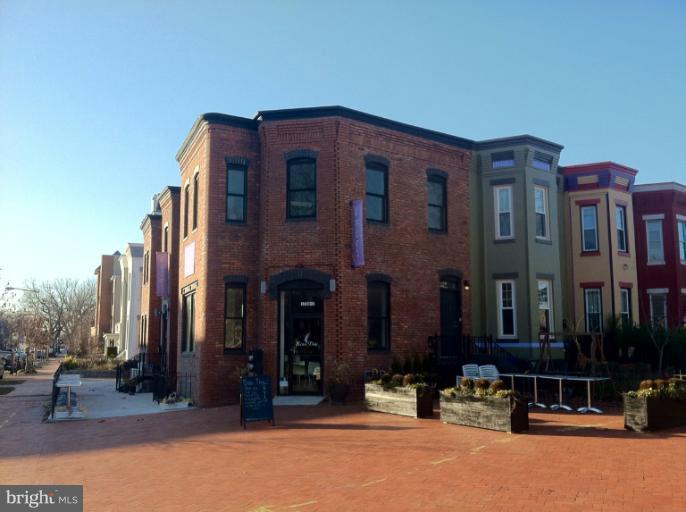 2128 1st Street Northwest, Unit 2 Washington, DC 20001 - Photo 14 of 28 a view of a building with a patio
