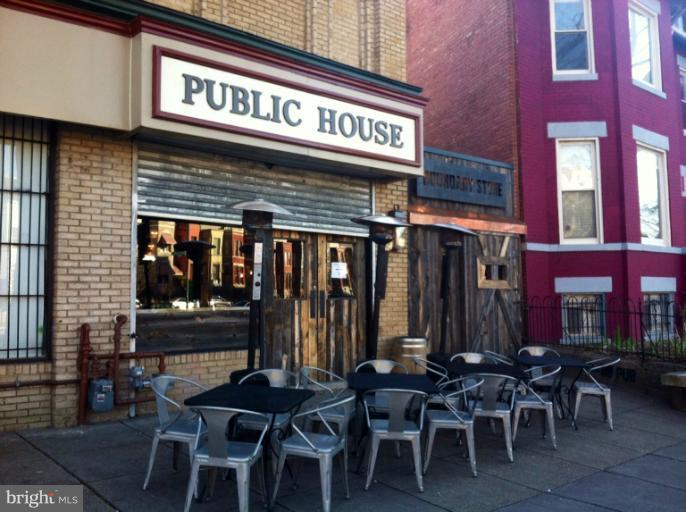 2128 1st Street Northwest, Unit 2 Washington, DC 20001 - Photo 18 of 28 a view of a cafe with a table and chairs