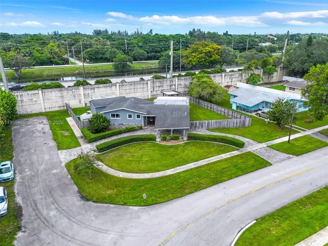 an aerial view of a table and chairs