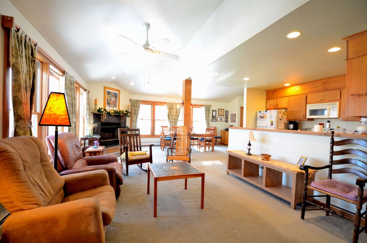 43 Pinnacle Road Otis, MA 01253 - Photo 3 of 16 a living room with furniture fireplace and a large window