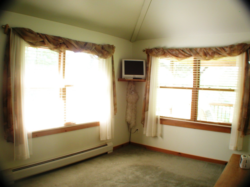 43 Pinnacle Road Otis, MA 01253 - Photo 7 of 16 a view of an empty room and window