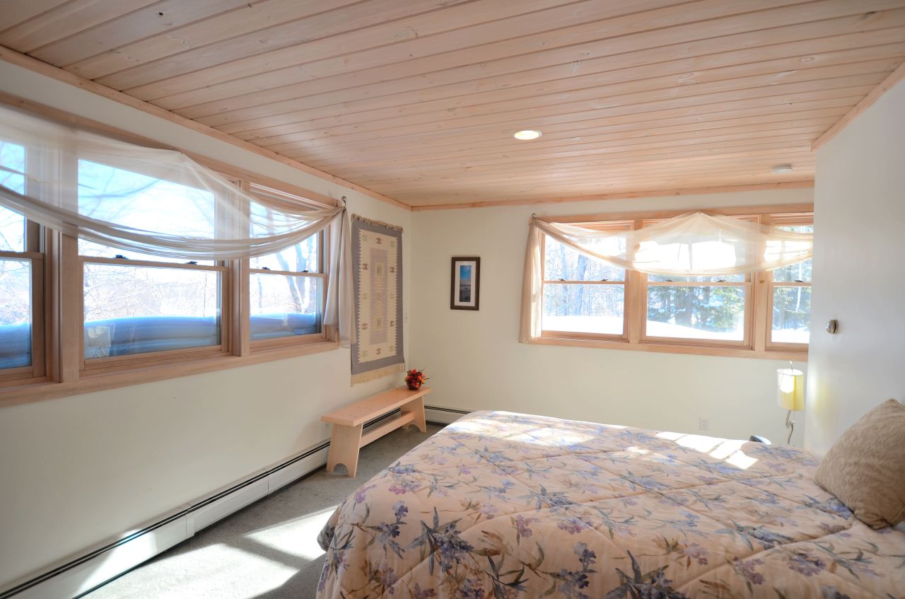 43 Pinnacle Road Otis, MA 01253 - Photo 9 of 16 a bedroom with a bed and a window