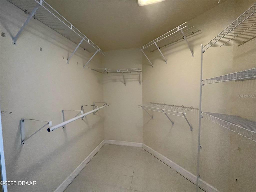 4575 South Atlantic Avenue, Unit 6203 Ponce Inlet, FL 32127 - Photo 13 of 34 a view of a room with racks on the wall