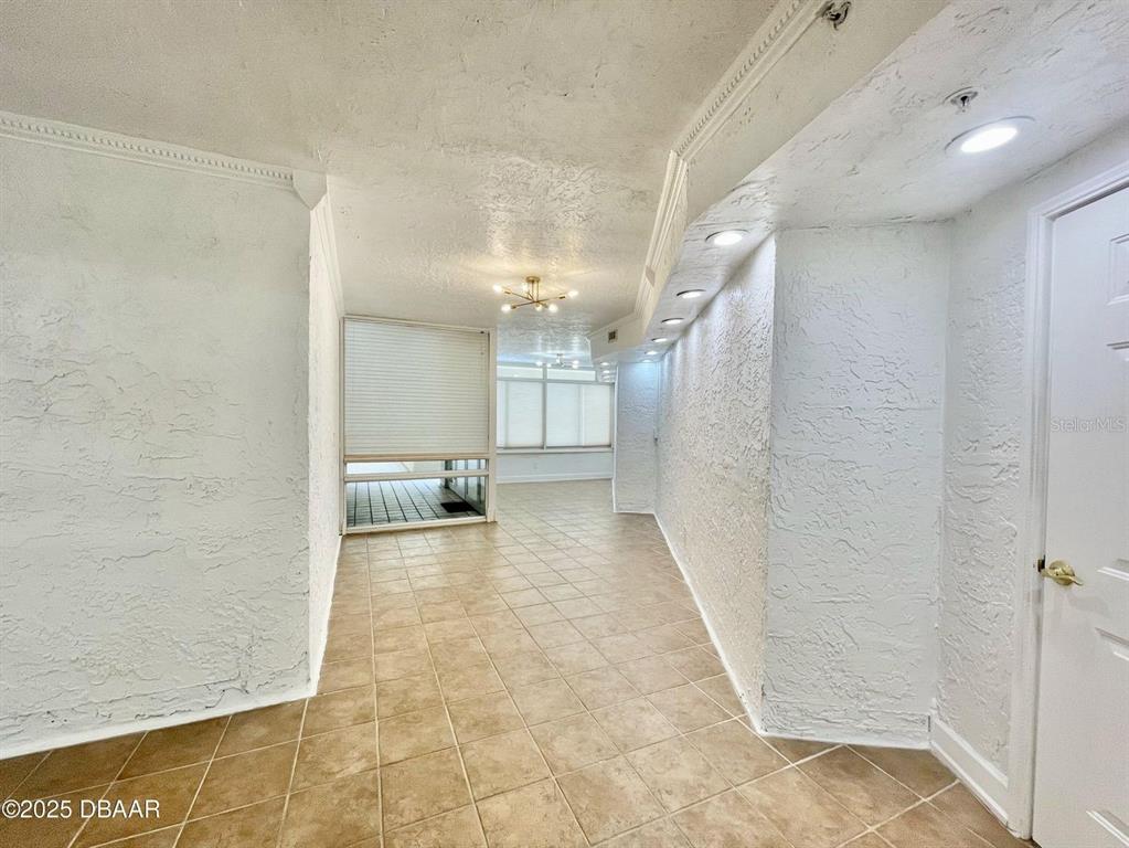 4575 South Atlantic Avenue, Unit 6203 Ponce Inlet, FL 32127 - Photo 28 of 34 a view of a hallway