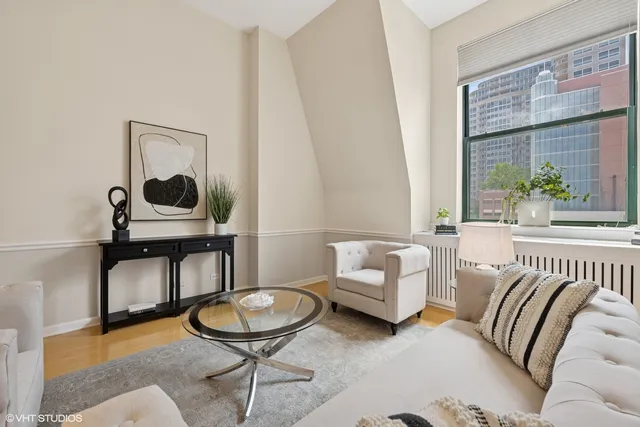 a view of a dining room with furniture and window