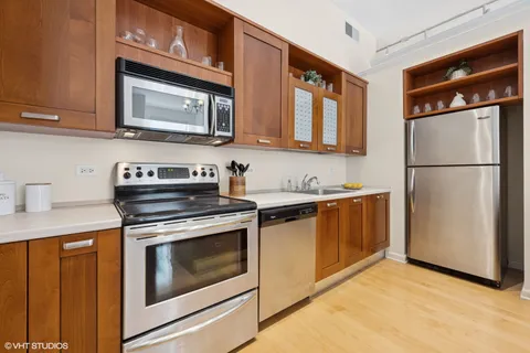 a view of a dining room with furniture and window