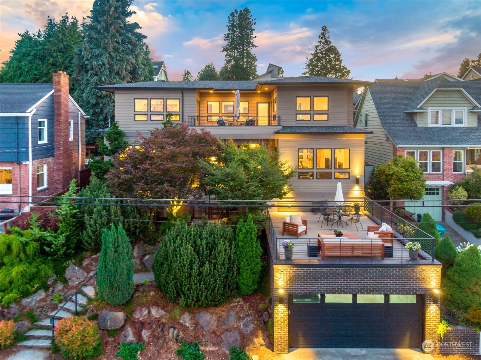 2717 36th Avenue Southwest Seattle, WA 98126 - Photo 1 of 40 a front view of a house with a yard