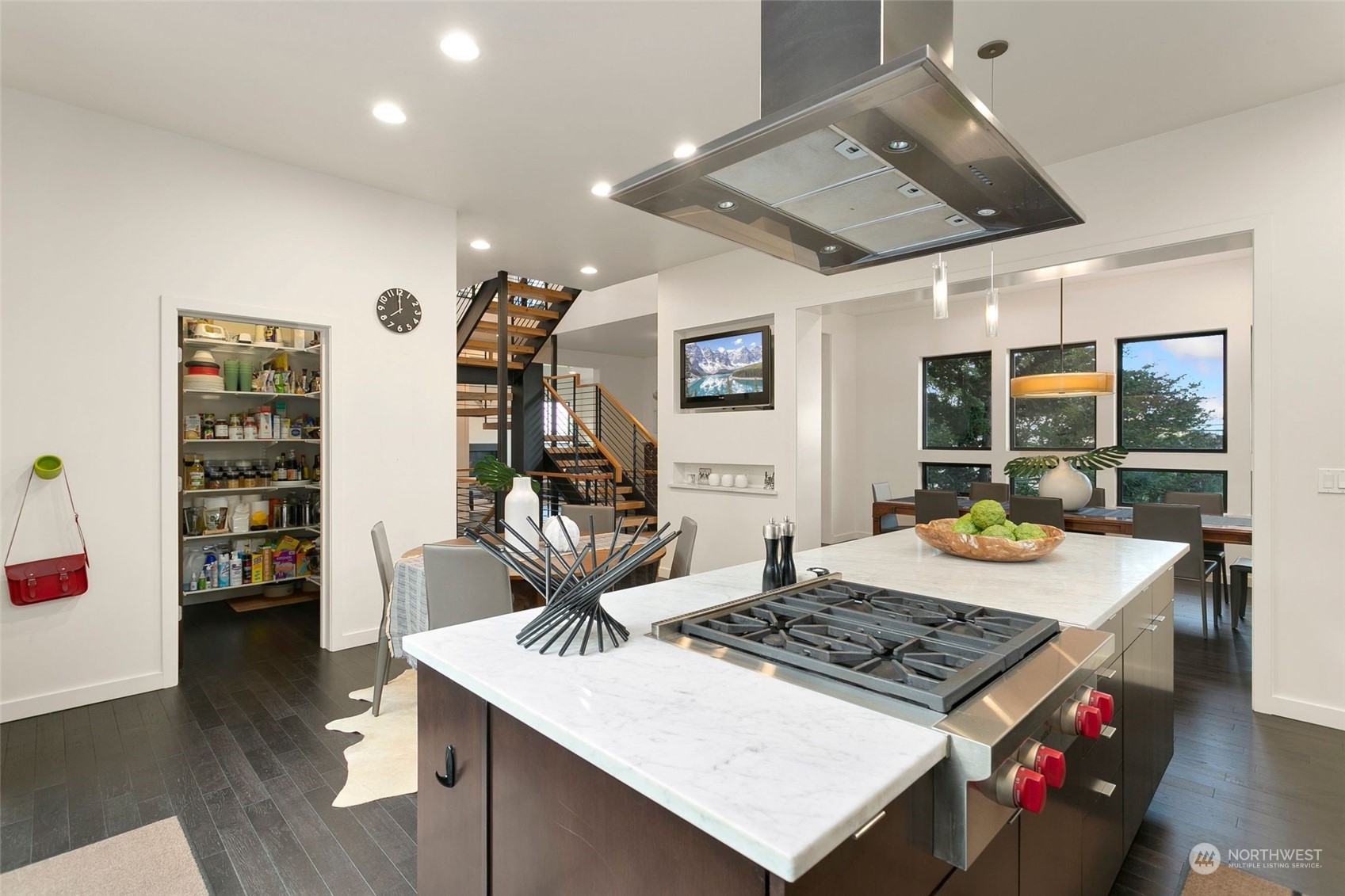 2717 36th Avenue Southwest Seattle, WA 98126 - Photo 11 of 40 a kitchen that has a stove and a table