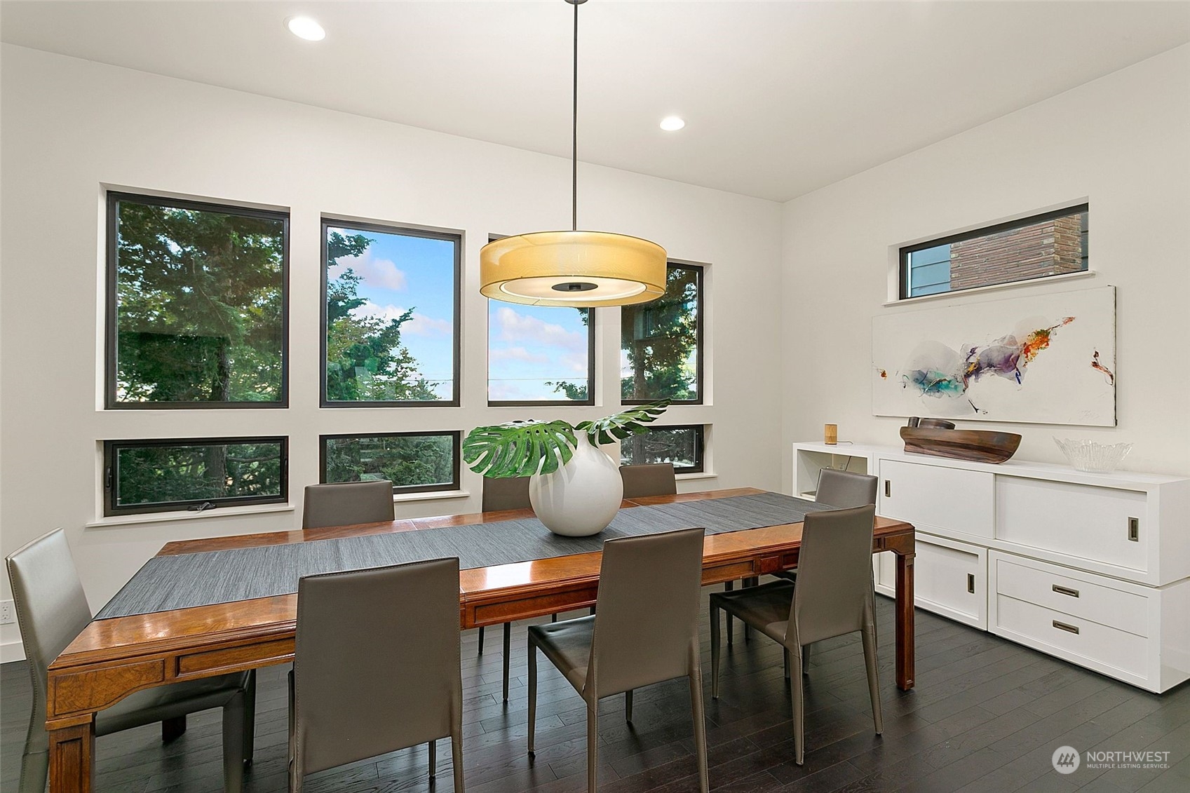 2717 36th Avenue Southwest Seattle, WA 98126 - Photo 12 of 40 a dining room with furniture a chandelier and window