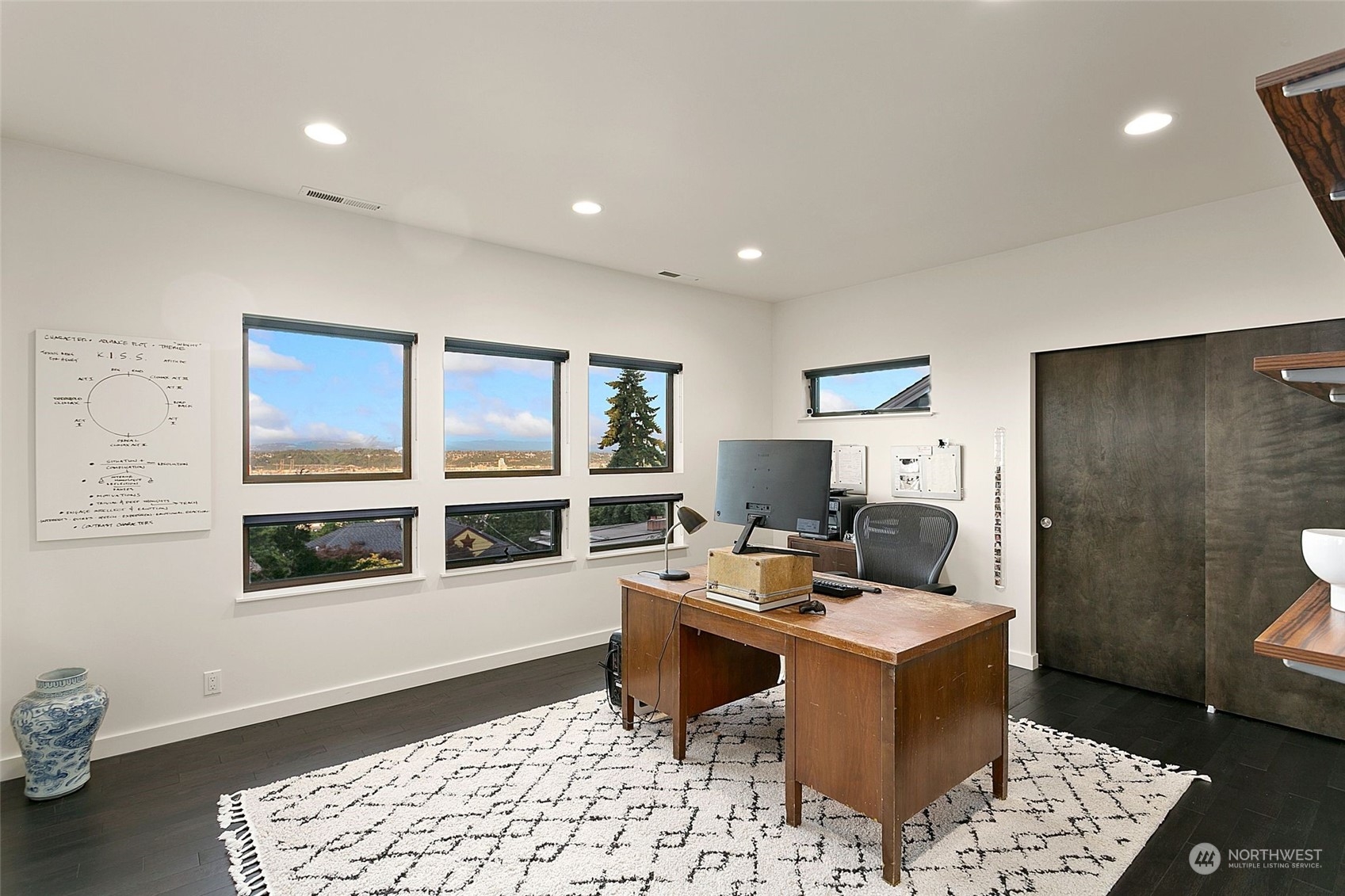 2717 36th Avenue Southwest Seattle, WA 98126 - Photo 20 of 40 a work room with a couch and a window