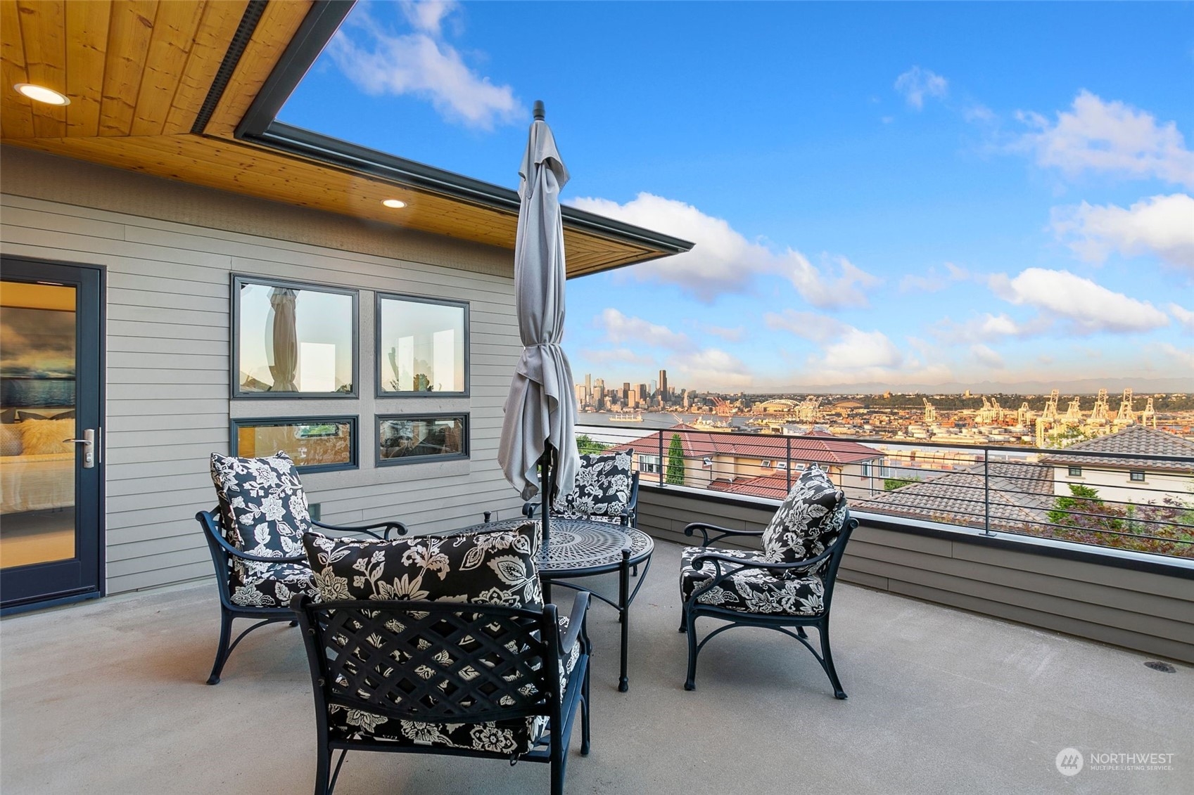 2717 36th Avenue Southwest Seattle, WA 98126 - Photo 22 of 40 a view of a terrace with furniture
