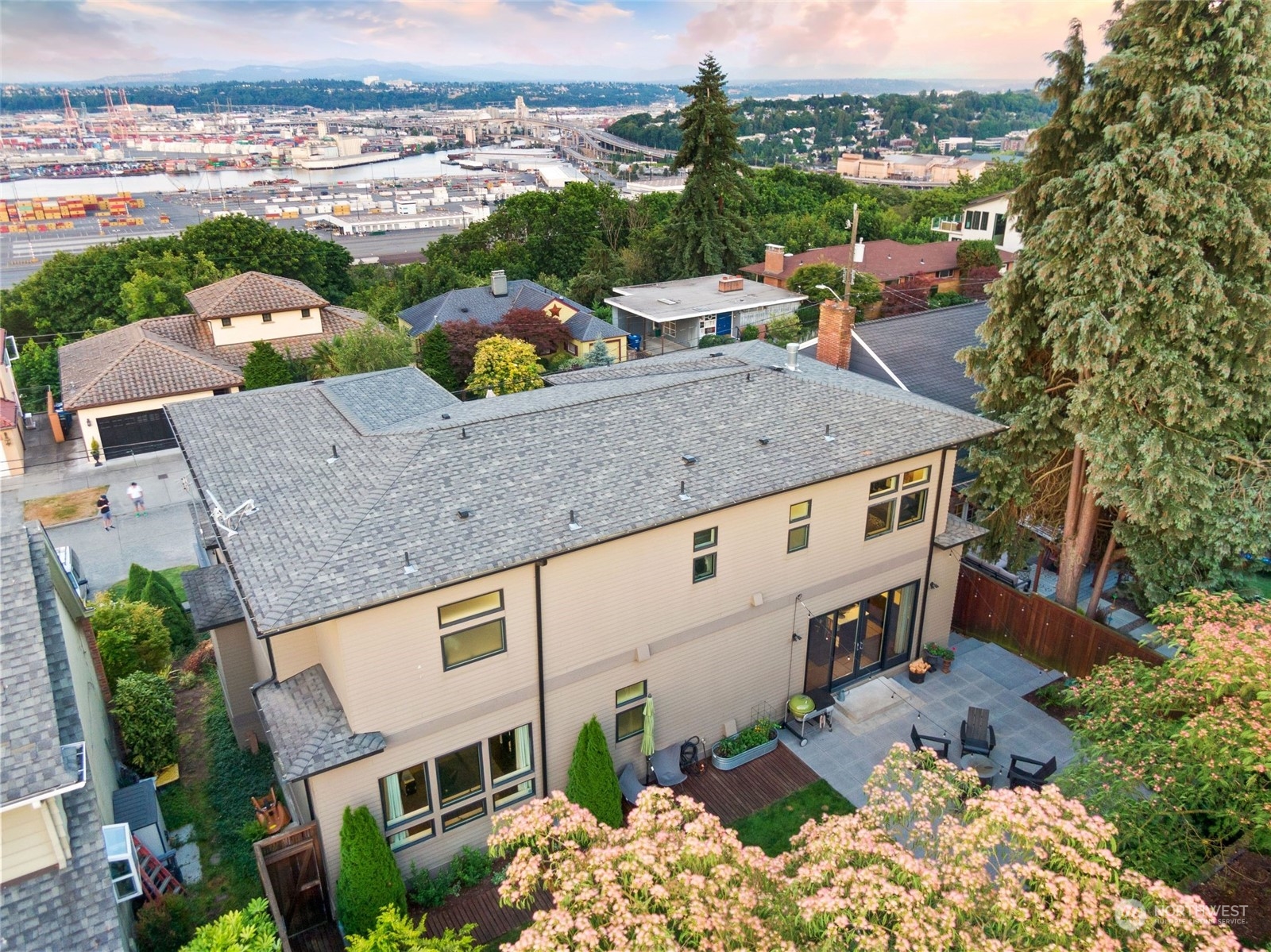 2717 36th Avenue Southwest Seattle, WA 98126 - Photo 37 of 40 an aerial view of residential houses with outdoor space and ocean view