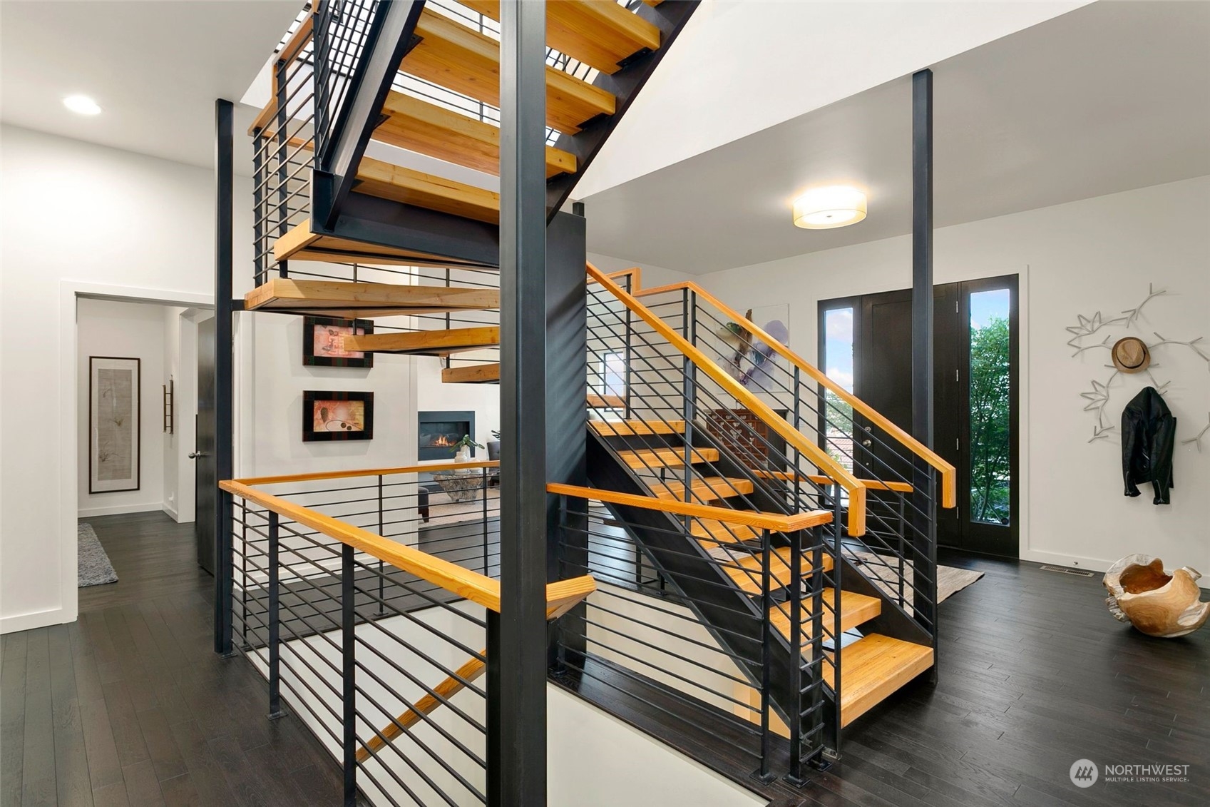2717 36th Avenue Southwest Seattle, WA 98126 - Photo 4 of 40 a view of staircase with furniture and stairs