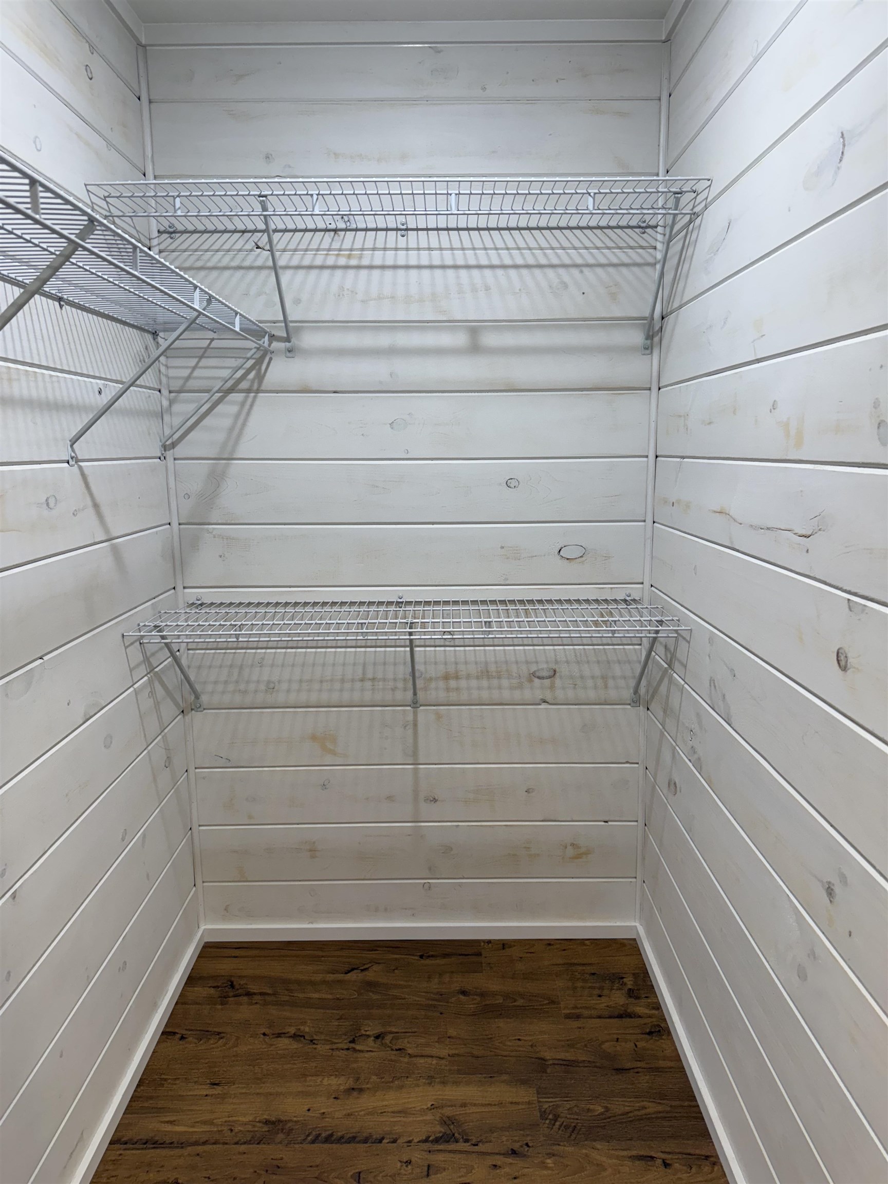 104 Young Drive Selmer, TN 38375 - Photo 12 of 12 a view of a room with racks on the wall