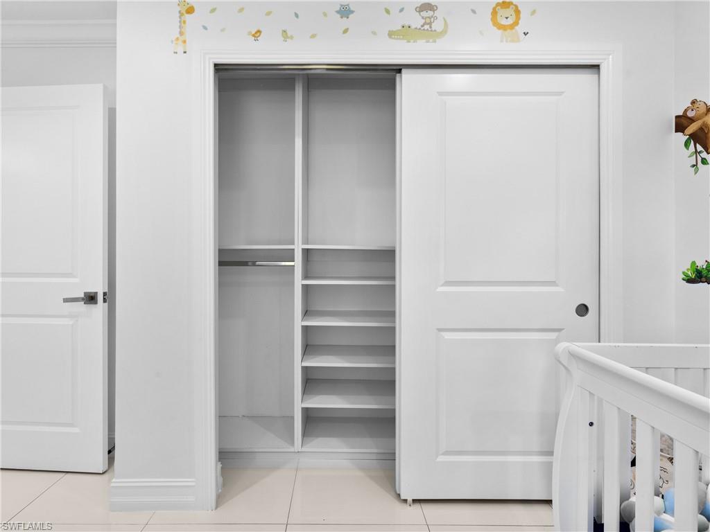 1837 51st Terrace Southwest Naples, FL 34116 - Photo 22 of 35 View of custom built in closet space, found throughout the entire home