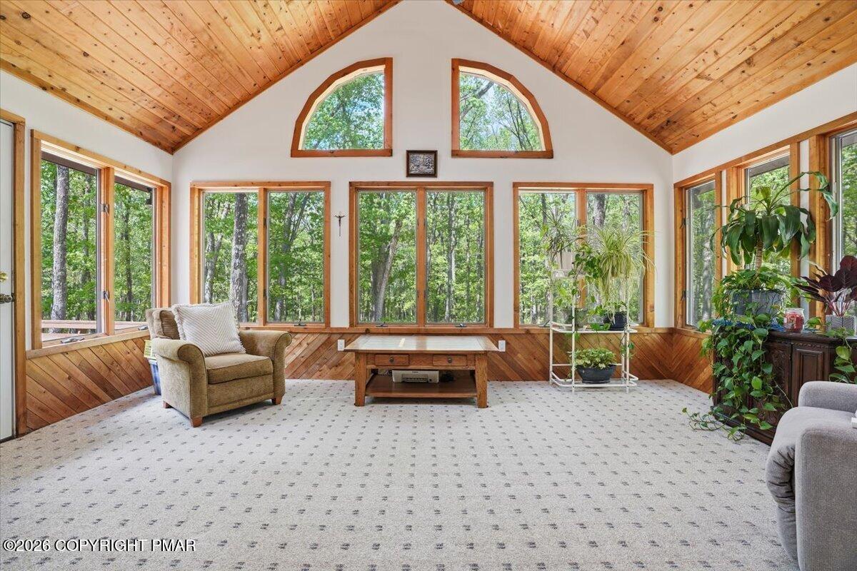 1517 Deer Run East Bushkill, PA 18324 - Photo 5 of 42 a living room with furniture and large windows