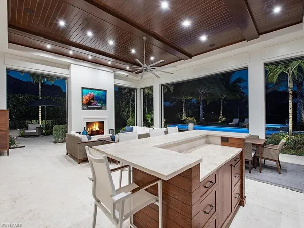 outdoor space with patio furniture and potted plants