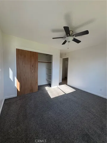 a view of empty room with windows