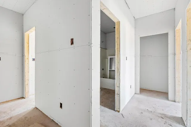 a view of a room with a hallway