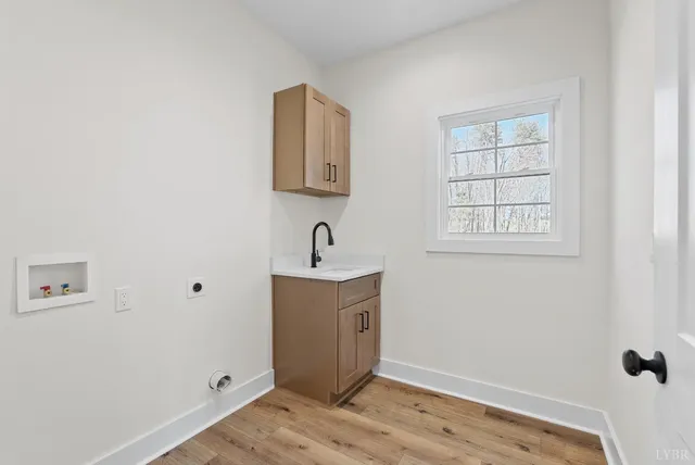 a view of a room with wooden floor and closet