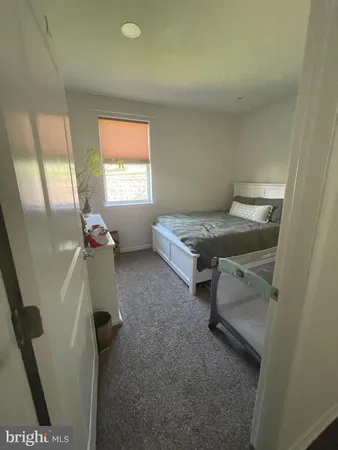 a room with a couch and a window