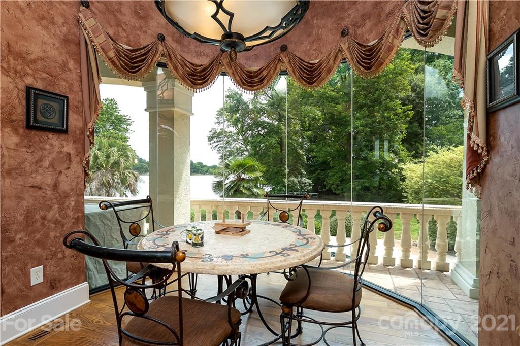 8891 Graham Point Lane Denver, NC 28037 - Photo 3 of 37 a view of a chairs and table in the patio