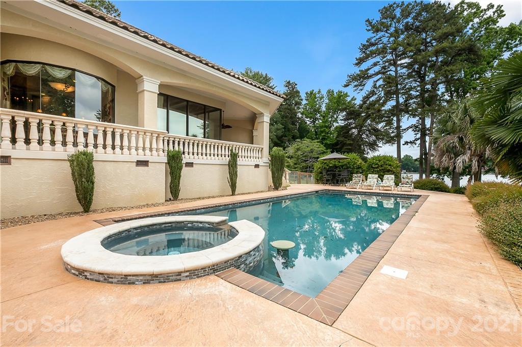 8891 Graham Point Lane Denver, NC 28037 - Photo 30 of 37 a view of swimming pool with a yard