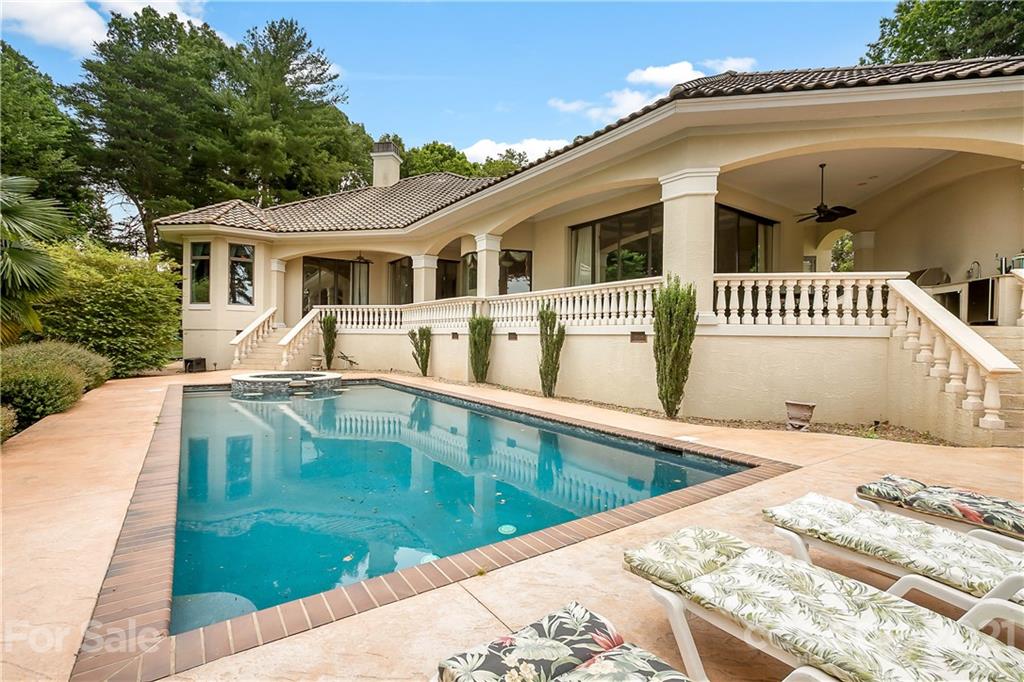 8891 Graham Point Lane Denver, NC 28037 - Photo 35 of 37 a front view of a house with swimming pool