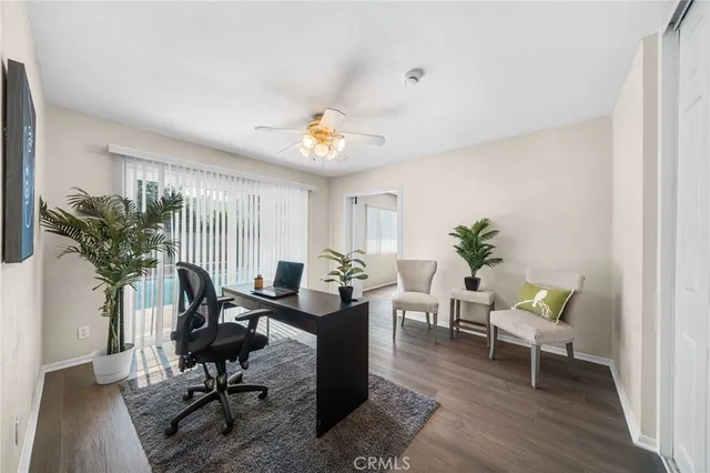 a workspace with furniture and window