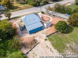 a view of a backyard of a house