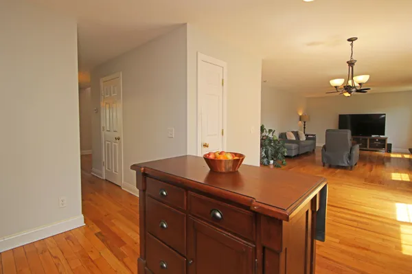 a room with a table and chairs